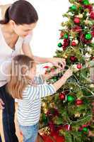 Mother and daughter at home at Christmas time