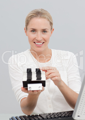 Businesswoman holding an index holder