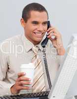 Businessman talking on phone in the office