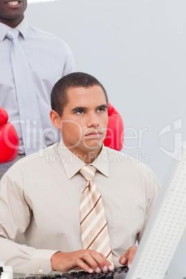 Boxing a businessman in the office