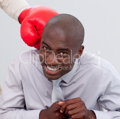 Portrait of an Afro-American businessman being boxed