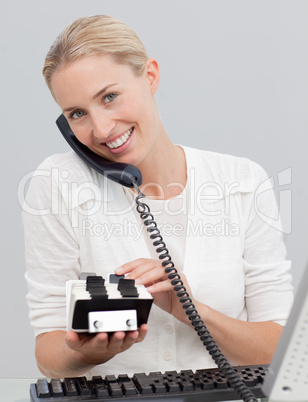 Businesswoman on phone and searching the index