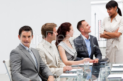 Smiling businessman in a presentation