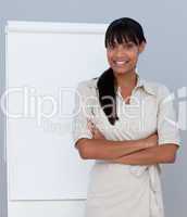 Smiling Afro-American businesswoman giving a presentation
