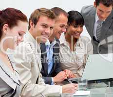 Young businessman working with his team