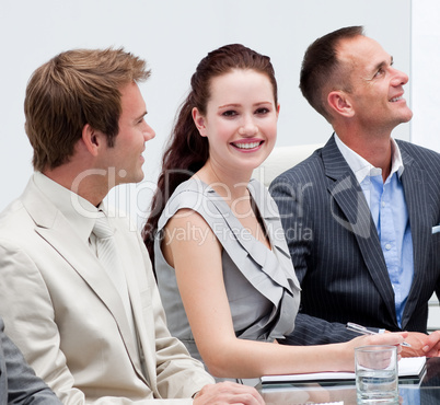 Beautiful businesswoman smiling in a meeting