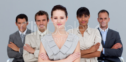 Confident multi-ethnic business team with folded arms