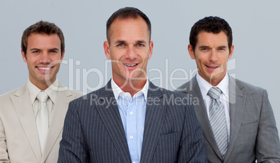 Portrait of smiling businessmen with folded arms