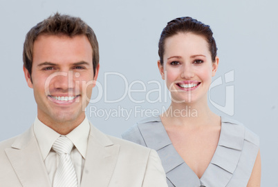 Portrait of a businesswoman with her male colleague
