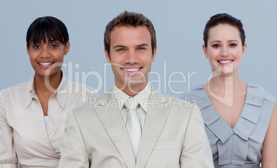 Multi-ethnic business team standing in front of the camera