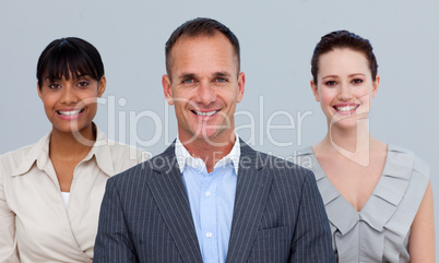 Smiling businessman leading his colleagues