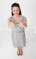 High angle of a businesswoman with thumbs up