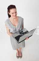 High angle of a beautiful businesswoman using a laptop