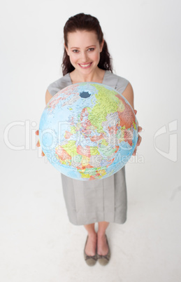 Young businesswoman holding the Earth planet