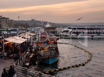 Restaurant boats by Galata bridge in Istanbul
