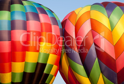 Two Hot air balloons bumping