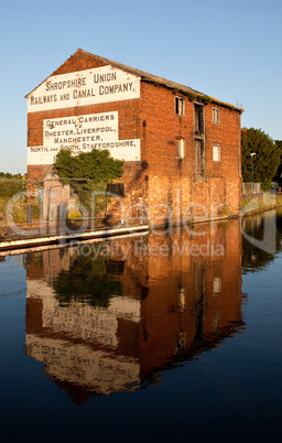 Shropshire warehouse reflected in canal at Ellesmere
