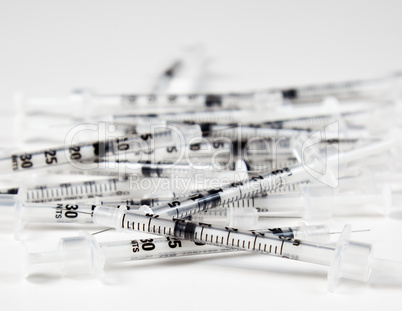 Pile of used syringes
