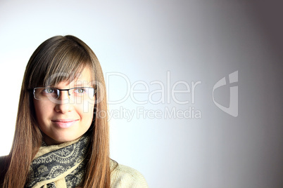 smiling young woman with glasses