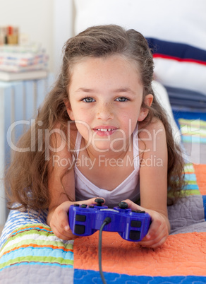 Little girl playing video games