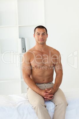 Patient sitting on hospital bed