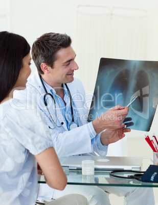 Doctors analyzing an x-ray