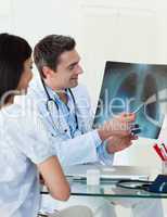 Doctors analyzing an x-ray