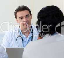 Male doctor explaining diagnosis to a patient