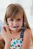 Close-up of little girl taking medecine