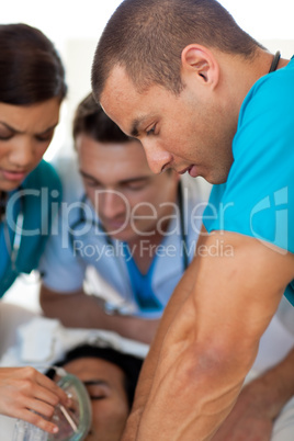 Doctors performing CPR on a patient
