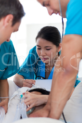 Medical team performing CPR on a patient