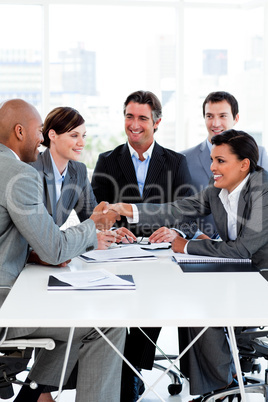 Successful international business people shaking hands