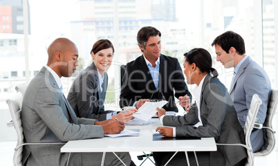 Multi-ethnic business people disscussing a budget plan