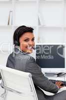 Ethnic businesswoman with headset on