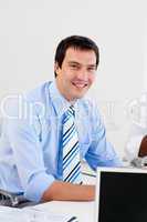 Portrait of a smiling businessman at work