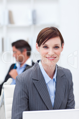 Young businesswoman working at a computer