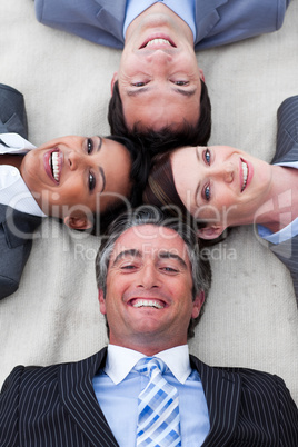 Manager and his team lying on the floor