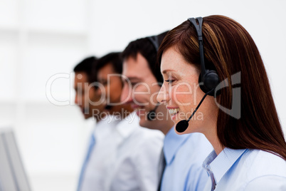 Multi-ethnic customer service agents with headset on