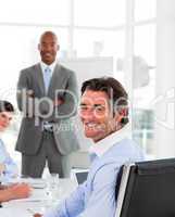 Businessmen in a meeting with their team