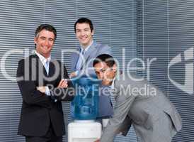 Multi-ethnic business team at water cooler