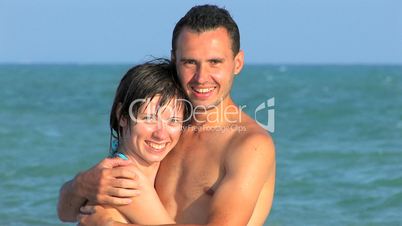 HD portrait of a young couple at sea