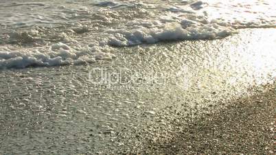 HD young couple walking on the seashore