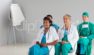 Medical team sitting at a conference