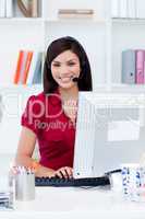 Young businesswoman with headset on