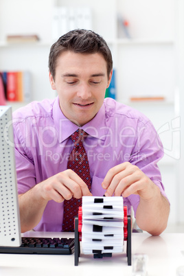 Portrait of a businessman searching for the index
