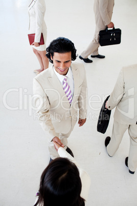Business people shaking hands in a business building
