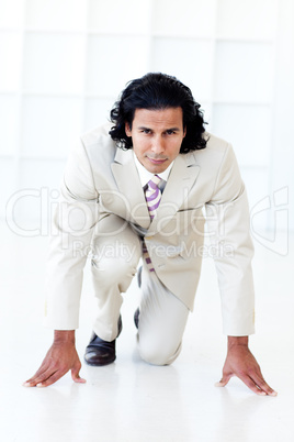 Businessman getting ready for a race