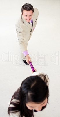 Business people passing a baton