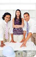 Smilinf female architect with folded arms in a meeting