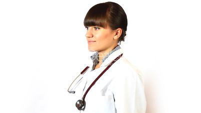 Portrait of smiling friendly female doctor